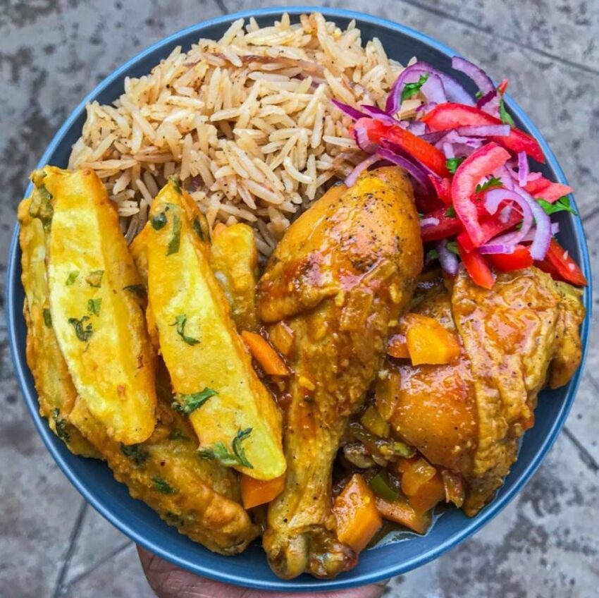 Chicken stew, plain pilau & battered potatoes and kachumbari