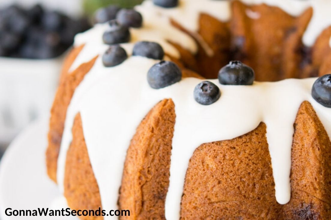 Whole Blueberry Coffee Cake topped with fresh blueberries