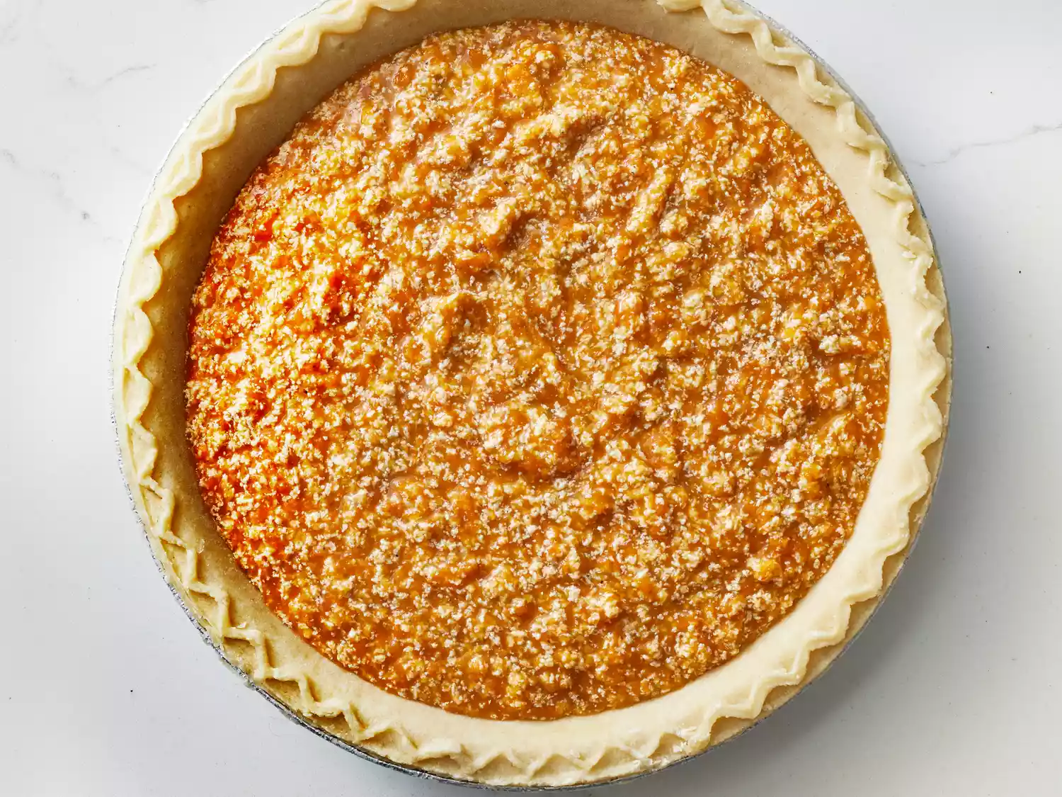 filling poured into unbaked pie crust.